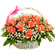 basket of coral roses with babys breath